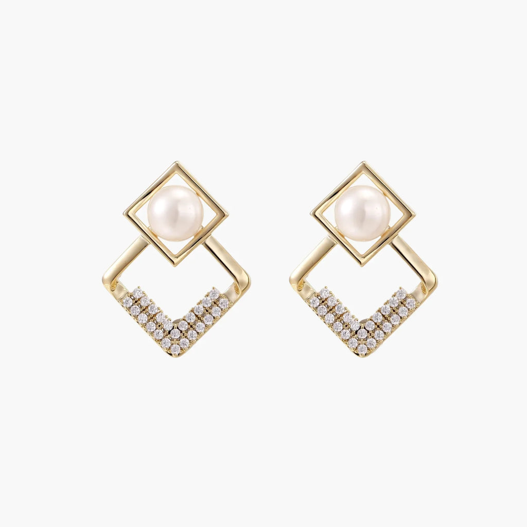 Gold-plated double square frame earrings with freshwater pearl and crystal accents on white background