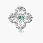 Sterling silver adjustable ring featuring four-leaf clover design with green center moissanite and clear accent stones