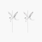 Delicate sterling silver dragonfly earrings with textured wings and curved threader hooks on white background